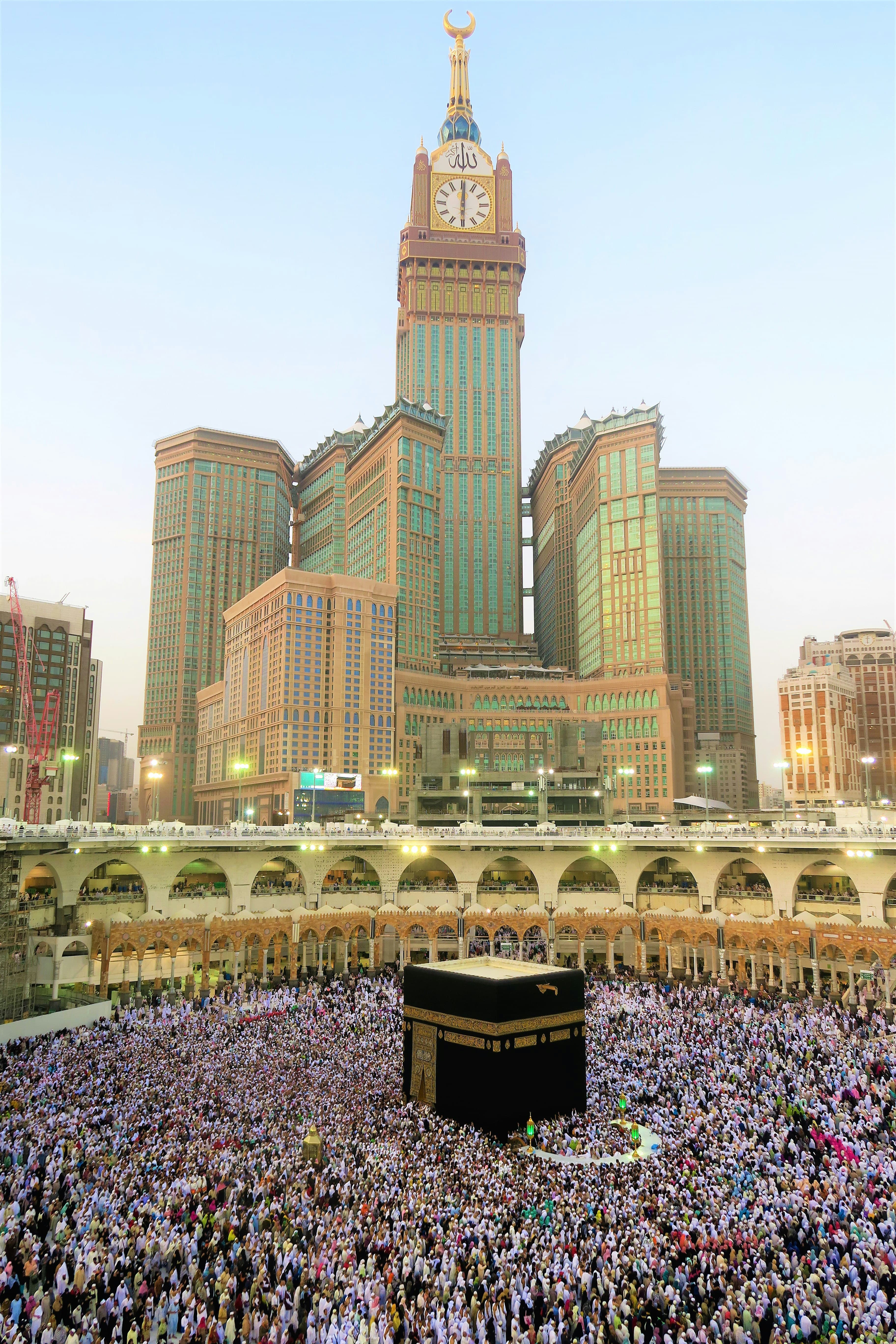 Aerial view of the Kaaba with Abraj Al-Bait towers behind it during Hajj